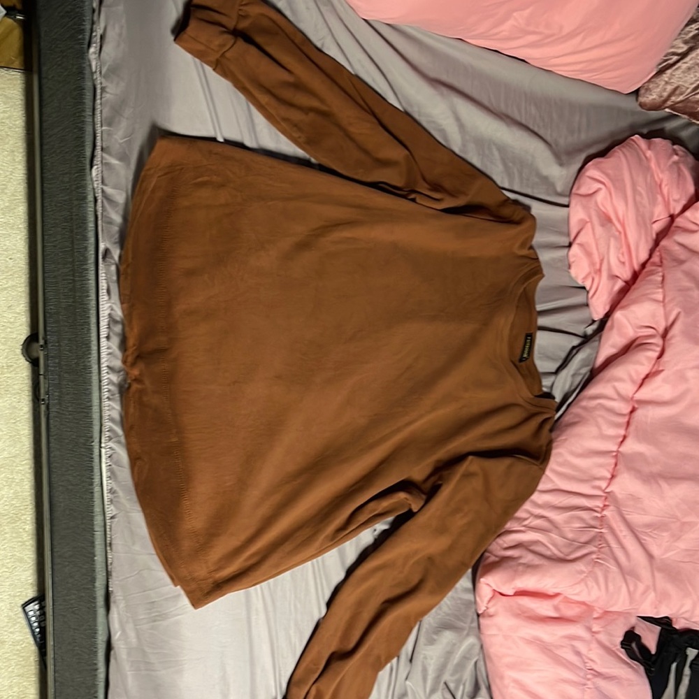 Brand new long sleeve soft top never warn too big when order came in